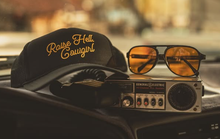 Load image into Gallery viewer, RAISE HELL COWGIRL TRUCKER HAT BLACK
