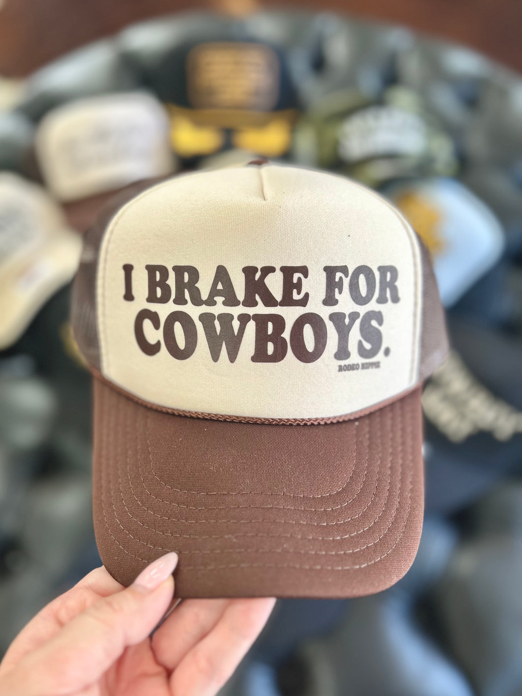 I BRAKE FOR COWBOYS TRUCKER HAT TAN/ BROWN